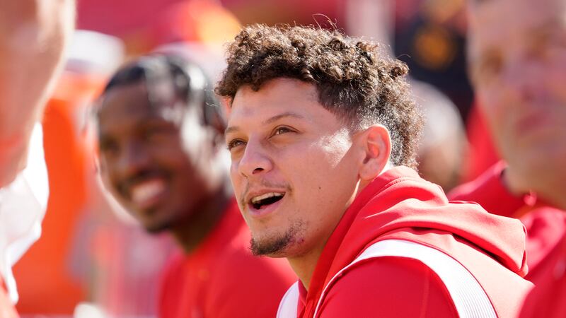 FILE - Kansas City Chiefs quarterback Patrick Mahomes waits to warm up prior to an NFL...