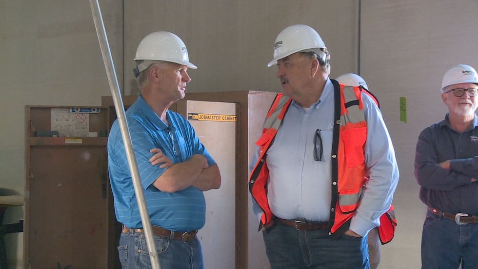 David Briggs (left) Sustainable Beef CEO, and District 42 Senator Mike Jacobson tour the...