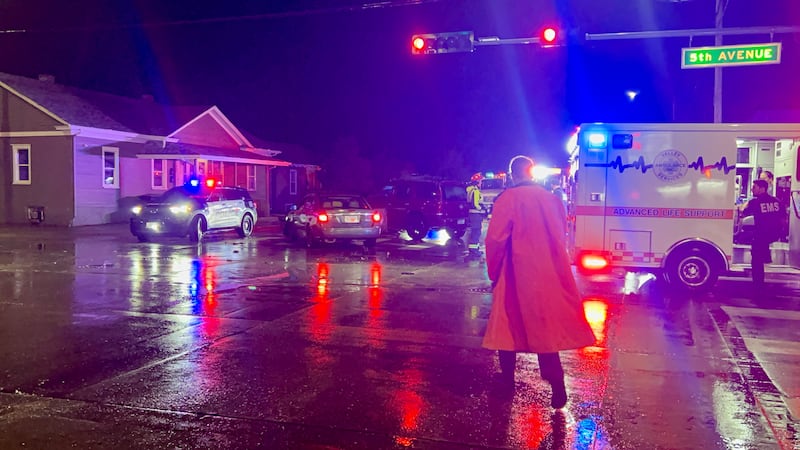 A driver arrested for DUI runs a red light leading to a collison with two injured.
