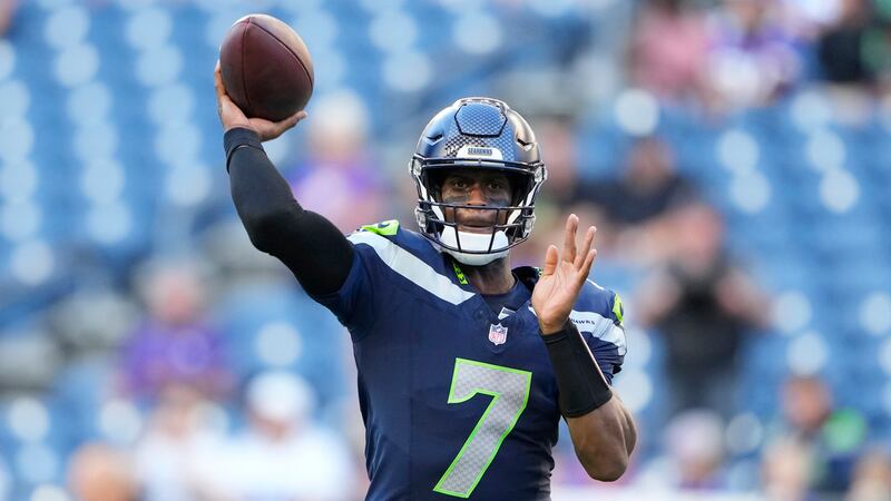 Seattle Seahawks quarterback Geno Smith (7) warms up before an NFL preseason football game...