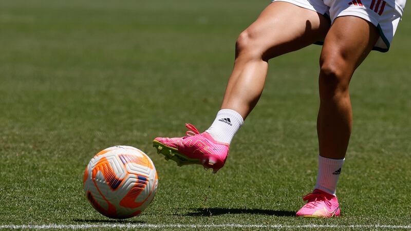A Wales women's national team member takes a shot during a FIFA Women's World Cup send-off...