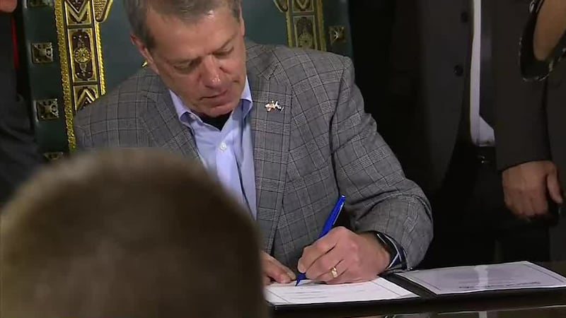 Nebraska Gov. Jim Pillen signs a bill in this file photo from earlier in the Legislative session.