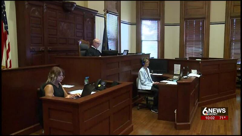 A court hearing between two political figures has been moved