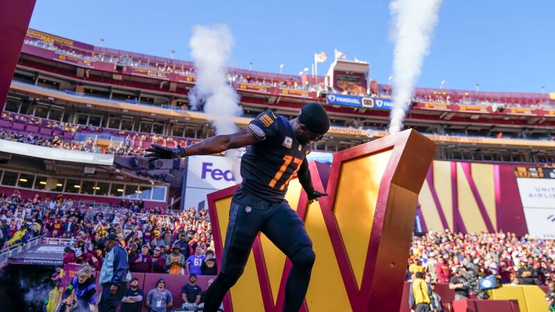 Washington Commanders wide receiver Terry McLaurin (17) taking the field before the start of...